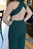 I bought this for my daughter for her to wear in the high school pageant and it was perfect.  The color was absolutely beautiful and it fit her like a glove.  She said it was very comfortable and the length was perfect with her heels.  It might be a little long if you are planning on wearing flats. Also, she did have the back straps taken in a bit just to give her a more secure fit across the bust since she was going to be up on stage and didn't want to worry about having to adjust her outfit.  If you are looking for a classy, beautiful jumpsuit, then look no further.  Buy it.  You won't be disappointed.  **Photo showing the back is the true color. Front photo was taken under stage lights with phone but still gorgeous.** - Mary G.