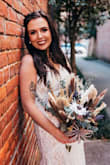 This dress was amazing for my wedding. The exact vibe I was looking for and fit perfectly. Get this dress!!! - Lauren A.