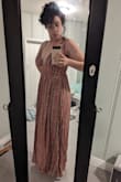 My size sold out while I had it in my cart but it had such good reviews that I got it in the next size up. Get it in your own size or even one smaller because the fabric has a lot of give. No regrets in buying it, it's cute enough to be worth altering. The tassels add a little something and if you have large breasts this will probably look amazing on you - Willow C.