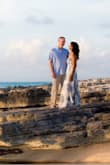 Wore this to my beach wedding. Perfect color and style. Had to get it shortened which cost me just as much as the dress! I also had the tailor reposition the button by the bust. It worked better but still popped open at moments but not a big deal. - Aneesha B.