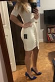 Love love love this dress. I'm 5'2", 123lbs 32b athletic build. The xs fits but is a tad too tight for a white dress. There is a built-in slip and If I was going with another color I may of kept that size. Returning and already reordered it in a small. Highly recommended this dress - Jaycie G.