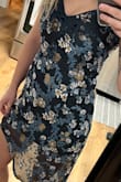 I love this dress! I usually order a medium and it fit perfectly. The one thing I would note is that the cut is pretty short, even if you're not as tall as the model. But overall I'm super happy! - Laura L.