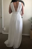 This dress was so beautiful and couldn't have fit better. It was long but I'm only 5'3" so it was expected. Wasn't see-through at all! - Evynn A.