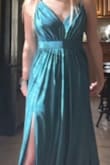 I absolutely love Lulus and felt pretty confident when ordering this dress. 
The color was a bit off, it was still a beautiful blue but not as icy as the pictures. I could have definitely ordered a smaller size but the dress is not flattering on me..(my opinion). Very highl waisted as well. - Callie W.