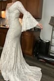 Not only did it fit like a dream, the material was gorgeous. It looked so much more expensive than it was ! I am so beyond impressed. - Erika T.