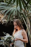 I loved this dress. It was so perfect for my elopement to Mexico. The quality was great, it truly did not look like it cost me only $120.00 USD. every time someone complimented my dress, I had to tell them how much I paid for it because it was such a great deal!!
The train was my favorite part. I ended up altering the front of it to make it look like a vneck and it turned out fantastic. - Bridget S.