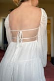 I am absolutely in love with this dress! It fits absolutely perfectly and will be the perfect dress for my engagement photos. The material is high quality and it is not see through at all. As an added bonus, the shipping was extremely fast! I can't wait to buy more dresses from this store. - Quinncy K.