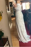 Desde la primera vez que vi este vestido me enamoré de él, mi boda será hasta el próximo año pero no pude esperar para tenerlo de una vez. Regularmente siempre soy talla S pero por alguna razón me queda un poco chico y lo tuve que cambiar por una talla M, tengo que hacerle algunas alteraciones en las mangas ya que están un poco amplias para mí pero lo demás yo creo que está perfecto no puedo esperar para usarlo el día de mi boda. Lo recomiendo 100% ya que la calidad es excelente para el precio. - Teresa R.