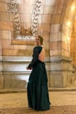 This dress fits perfectly! I did get it hemmed a couple of inches, but taller heels would have worked too. It frames you so perfectly and I love the open back. The color was gorgeous. - Alysha