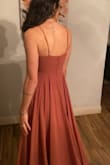 The dress is a tad heavy but it's perfect! It has the perfect fit and flow to it. I am absolutely in love!!! - Gabi P.