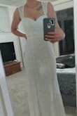 I truly was not expecting this to fit so well and to be such beautiful quality. I put it on and was immediately in tears of joy. The length was perfect, hugged my hips just right, it is comfortable enough to sit and to dance in, it isn't see-through. I've tried on $1,000+ dresses and none of them compared to how well this one fits and looks. Great job Lulus! I cannot wait to wear this on my wedding day. - Kaitlyn I.