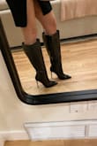 Love these boots for the price, I imagine they will only be on trend for a short time and the price point is perfect. As the other reviews state, these are not comfortable walking, I found thicker socks helped a tad but they are an awkward angle in the footbed. Great for a night you plan to only uber or cab places. I usually fall between an 8.5 and a 9 for shoe size and based on reviews went with a 9, this was a mistake for me, they are definitely large. I am 5'8", 130 lbs and the calves and ankle ended up being really loose. Still, love these though, and like $27? You can't go wrong. - Monica W.