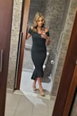 I wore this dress to a wedding and it was great for the occasion. The color and style of this dress are exactly as described. It definitely fit tight to the body hugging every curve, but was super flattering and I got so many compliments on it! I would love to get it in a different color. - Christina P.