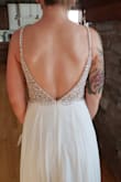 I had seen a similar dress for close to $1,000, so to get this dress for only $220 is a steal! It is made really well and looks fantastic. I was a bit worried because my cup size is so small and the dress is backless, but it actually has built-in support, so no strapless bra is needed! The length is a little long on me, so it drags a bit, but that will be an easy fix! I am so happy with this purchase, and I can't wait to wear it at my wedding in August! - Catrina H.