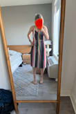 Looks very nice! The quality is pretty good. It's unique and beautiful. True to size. I usually order small and pretty much all Lulus dresses fit me well. - Olesya P.