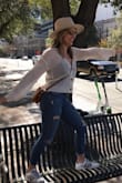 I love this sweater...it fits great and is comfortable. Very girly and cute. Great quality! - Stephanie S.