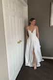 I work in bridal and couldn't decide on what I wanted to wear for my beach wedding coming up in November. I bought a few dresses to try and put this on and knew it was perfect!

I will be adding buttons to the back where the zipper is, take the straps up just a bit and a hem and it will be my dream dress!

I purchased a 6 when I typically wear a 4, so it's a tiny bit big which is easier to take in than smaller. 

I'm from Canada and did have to pay duties, and sending back my other dresses was no issue at all! 

Thanks, Lulus :) - Natalie E.