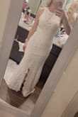Fits perfectly! Like it was custom made! The fabrics and details are very pretty as well! Also loved that sent a dress bag that you can hang and keeps it protected! Could not be any happier with this dress!! - Celimar B.