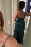 This dress is adorable. I usually wear M clothes but I got a small and it fits perfect. Straps are adjustable which is amazing. 10/10!! - Kristen D.