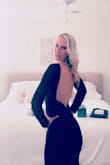 This is your new go-to LBD! 
Wore to a February wedding and loved it. So many compliments that it was classy and yet super sexy. Great fit. Length fell a little below the knee. Felt very breakfast at Tiffany. The back was the Oh hey now moment. Revealing enough without being too much. Hugs ALL the right curves. 
The boning in the back gives great structure. 
I danced and easily moved around without worry. 
I didn't give five ***** for two reasons. First, the sleeves are somewhat long. Not a deal-breaker because I could tuck them up. 
Second, the shoulders were slightly slipping. So just applied double-sided tape on the inside of the shoulders and voilà! No slippage. 
Don't hesitate. TYS - Catherine K.