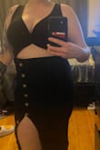 Dress fits well, very comfortable material and stretches but also feels thick enough to be secure. The only thing is that I didn't realize how high the slit goes - still wearable, but the other buttons are only for decoration and you can't button them down to make the slit smaller. Very flattering, and I like my dresses a little tighter so I ordered a Medium instead of a Large and it was perfect. Also my boobs are not the perkiest, so I had to wear a good push up bra which is hidden completely thanks to the design. - Deanna H.