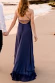 I wore this for our engagement photos at the beach and it was super fun and photographed great! It can be made looser or tighter because of the ties in the back! - Susanna M.