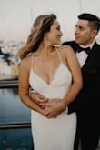 I freaking loved this dress! I wore this as my second dress (reception) for my wedding and it was so comfortable and sexy! I am 5'6'' and wore low heels so I had the dress hemmed a few inches. My wedding pictures didn't do it total justice as it was just so gorgeous in person. Perfect for a beach wedding! - Zorana N.