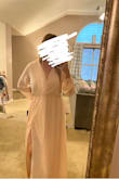 I wore this for engagement pictures and it was perfect. I ordered a size Large and it was too big in the waist, but fit perfectly up top. I pinned the waist with safety pins, and it was PERFECT! Couldn't see the pins either. My bust area was covered well. 
The medium was too tight in the shoulders and didn't cover the bust area. Overall if you have a bigger bust, definitely order your normal size and just pin the waist a bit! The second picture shows it pinned back from the front! - Brooke K.