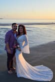 The dress is absolutely gorgeous!! It is high quality and I couldn't believe how well it was made for the price. The fit was amazing and the dress is very flattering. It is true to size and I washed it on the gentle cycle after our vow renewal and hung it dry and it came out perfect!! A must buy!! - Katie S.