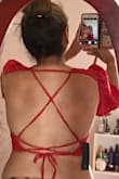 The top is labeled as a crop top but I thought it would fit a tiny bit longer. Still cute and perfect if you're looking for a true crop top. - Mo M.