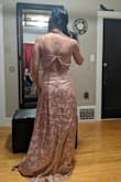 The fabric is so lovely to touch, and it was such a flattering dress! I wish it came in more colors. If it had been white, this might have been my wedding dress (I bought about 6 dresses to try on and returned 5). If I were looking for something more like an evening gown, this would have been it, hands down.

I got an XS despite normally being an S, because they didn't have S available when I ordered. You can tell from the back that S would have been the right size. I'm planning on returning this dress and getting one on the right size and a different color. - Esther C.