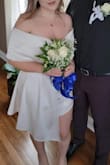 This dress is stunning. It's short but so beautiful. It looks so elegant. Wore it for me courthouse wedding. Got so many compliments on it. So beautiful. - Linda G.