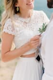 I think I loved this dress as much, maybe more, than my actual wedding dress. I wore flat sandals, so all I needed altered was the length. I had about 2 or 3 inches removed. It was flowy, not too heavy, and the quality of the top lace was great. I'd love to be able to wear this dress again. - Sierra H.