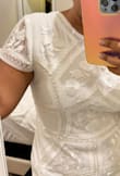 I was looking for a dress for my civil ceremony and I ordered this dress as one option. Well, this is the winner! The fabric is truly beautiful, delicately made. Looks very elegant. It runs a bit small because I am usually a L and had to order an XL for this dress. 100% recommended! - Laura B.