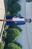 I wore this for my college graduation in May of last year! Wow, what a beaut. It hugs just right while still allowing me to breathe (and eat a ton). The length was great, and I paired it with yellow Lulus sandals. - Sam L.