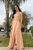 This two piece dress is so cute; the material and style overall is beautiful. It was a little long, but I made it work. - Nora B.