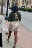 I wore this in winter in Atl to a museum. I felt very comfortable and stylish. The lining made it very soft and the zipper was durable. It class at a great length to still be active. Wish they had in other colors. - Makeda W.