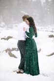 I wore this dress for our engagement pictures. It was such a great, flowy dress! As others have mentioned, the bust area is fairly revealing and might need some pinning. I was able to get away with just tying it tightly and did not use alterations. Otherwise, the length is great for tall gals! - Laura H.