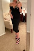 I normally wear a Medium but the Large fit better in this dress. The fabric was comfortable and a bit stretchy. The shoulders fell a bit more than I liked but it was flattering. I used Hollywood tape to hold the top up since I went braless. I got lots of compliments on my dress, which made me feel great. A bit hard to dance at the wedding I attended when wanting to lift my arms, but it didn't stop me. ;) - Jessica K.