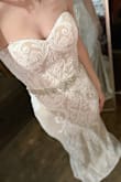 I was worried it wasn't going to fit good because I am such a petite woman but it fits perfectly! I'm not wearing my 4" heels in the picture but when I have them on the dress is at the perfect length. The material is such beautiful quality given the price! It is a little more beige than what the picture shows but works for me! I can't wait to wear it for my wedding! - Rebecca D.