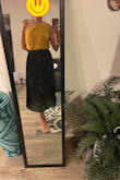 I absolutely love this top. Cannot think of anything that is not good with this top. It goes perfectly with different types of bottoms, mom jeans, wide-leg pants, pleated skirt, high waisted shorts. I'm thinking of buying another one in a different color. - GG P.