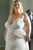 I got my dress in the mail within a week and it came so fast. I was so happy to try it on and see how it fit. The bodysuit was different, I never wear them. I'm very glad there is a bodysuit so you don't worry about anything showing. My only thing is I have a big chest, so I'm going to be looking into a silicone bra most likely to hold the girls up. Other than that it's perfect and I can't wait for the day to come I spend the day in it for our wedding this fall! I haven't fully done my hair up or anything yet because I'm a busy mom and want it clean and ready for the day. - Sarah M.