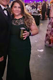 I needed a dress for a Mardi Gras Extravaganza and this dress was perfect!! Love the color and it fits like a glove. No bra is needed which is a big plus for me! Love the material! Does not feel or look cheap at all. I had a lot of trouble zipping and unzipping the zipper all the way. So I just unzipped the lace area and slipped the dress over my head. Worked like a charm! The only issue I had was the length. I need to take off probably like 4-5 inches to make it not touch the ground. I ordered it just in time to wear it so I just kept bunching it up for the night. Would definitely recommend this dress for any occasion! - Sabrina M.
