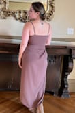 This is a size small. I ordered 12 dresses for a wedding. This one was the winner. No hemming is needed. Flattering as it hides the tummy. Didn't wear a bra, but can't go commando in this with that slit. Glad I didn't because it was a windy day in SF! The only thing is the dress wouldn't lay completely flat on the back as you see in the pic, probably because of my butt. Not a real issue to me though. Overall would recommend it! - Elora S.