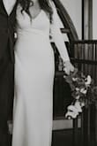 I ordered this dress last minute for my postponed wedding reception. I received so many compliments and felt great in it! It was a tad big on the waist and the sleeves were too long. I got minimal alterations done and it fit perfectly! - Alyssa S.