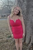 Looks red says hot pink [it] is hot pink. I loved this dress for homecoming - Charity S.