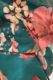 The dress is pretty but the colors are very different from the pictures shown. Much darker green and more burgundy in flowers. Not red. This dress is way off from what is shown. - Melissa A.
