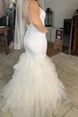I bought this dress to save money for my wedding. Lulus amazed me with how well the dress was made and how fast the shipping was. The dress doesn't really have much stretch to it. So if you're in between sizes. It might be good to go up a size. You can always get it altered. I feel like a princess in this dress and I am very excited to wear it on my wedding day!! Thank you Lulus!! - JUlia M.