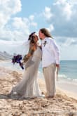 Had to find a new wedding dress one week before my wedding. This couldn't have been a more perfect dress. It was gorgeous in person and flattered my curves. The straps are a little uncomfortable after a little while wearing it.  I felt like a princess in this dress!!! - Brandi B.