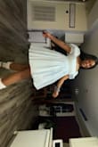 I ordered this dress to wear to an Alice in Wonderland themed bar pop-up and I loved it! I ordered a medium but definitely should've gotten a small! I was concerned with the no-stretch material but could've gotten away with a smaller size for sure! I got so many compliments on this. Must buy! (I did wear a petticoat underneath for a little more flare!) - Taylor J.